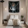 A beautiful bedroom whose hangs a tapestry on the wall