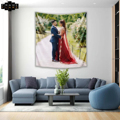 A beautiful living room whose hangs a tapestry on the wall