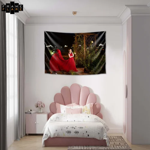 A beautiful bed room whose hangs a tapestry on the wall